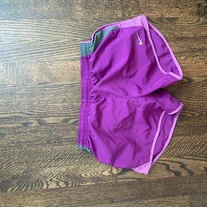 Purple Nike running shorts